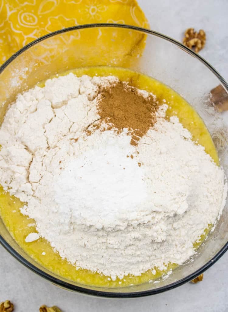 adding dry ingredients, all-purpose flour, baking soda and ground cinnamon