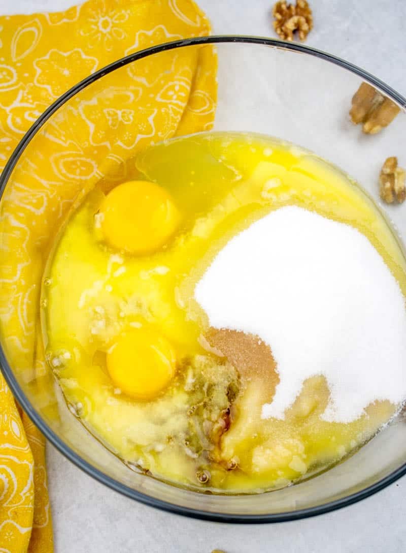 mashed bananas, eggs, sugar, vanilla extract in a large mixing bowl.
