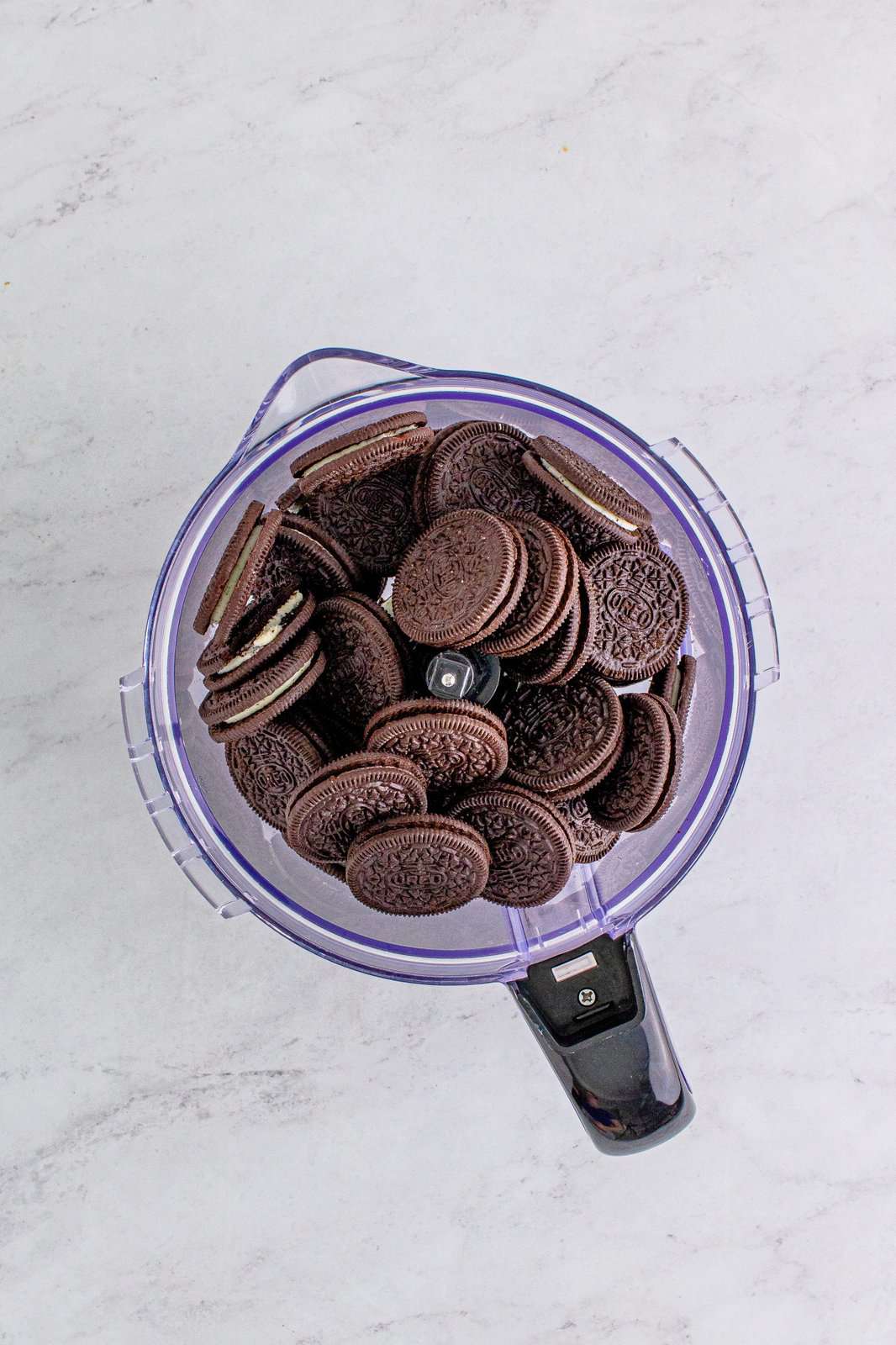 oreo cookies shown in a food processor.