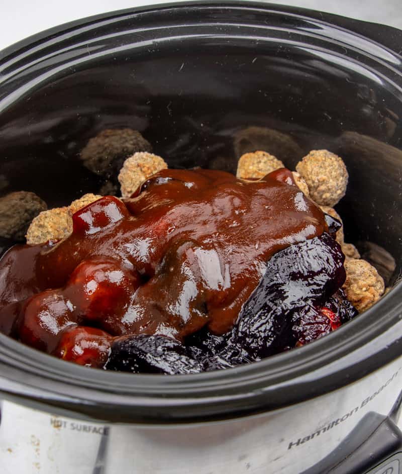 frozen meatballs, grape jelly, bbq sauce in a crock pot.