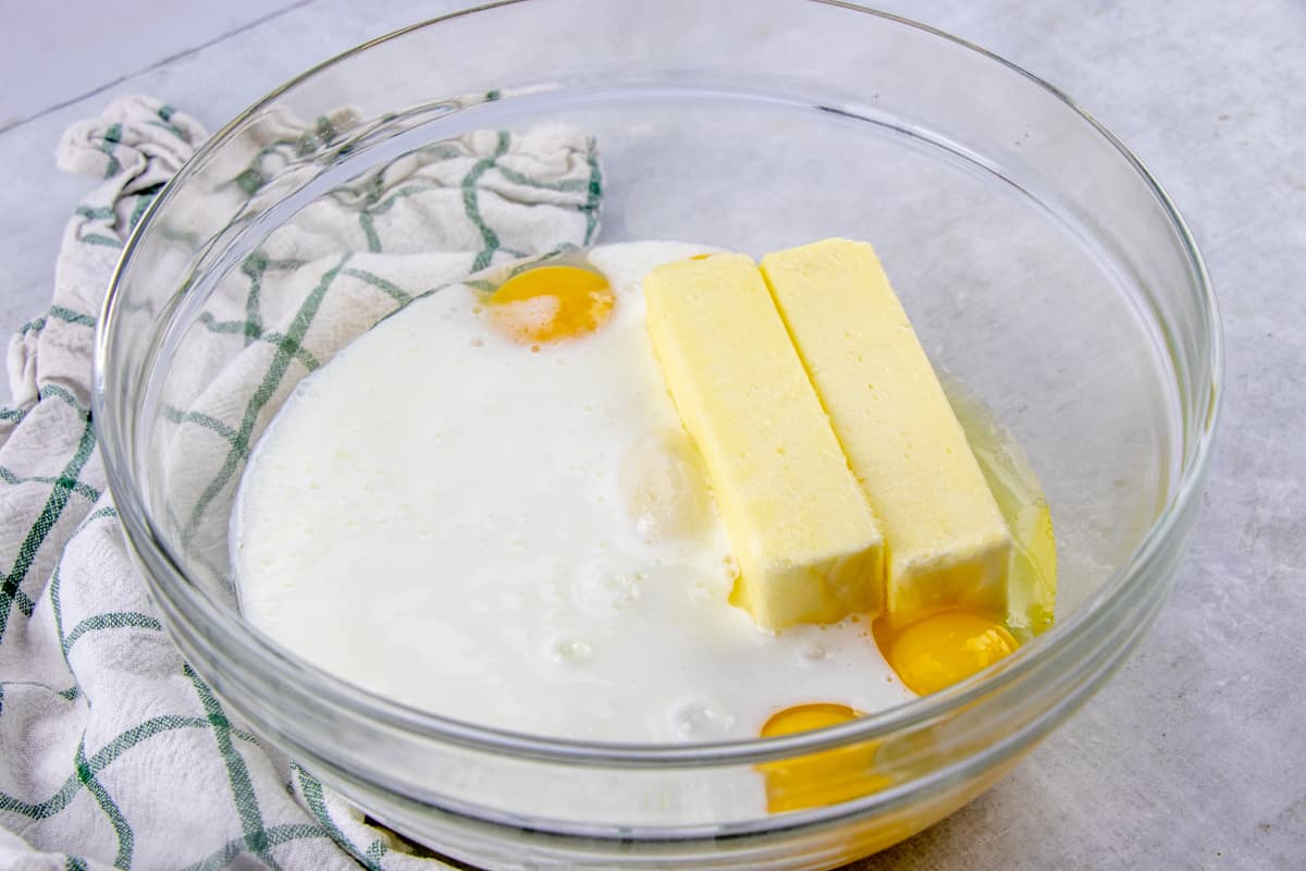 eggs, butter, sugar and buttermilk in a large glass bowl.