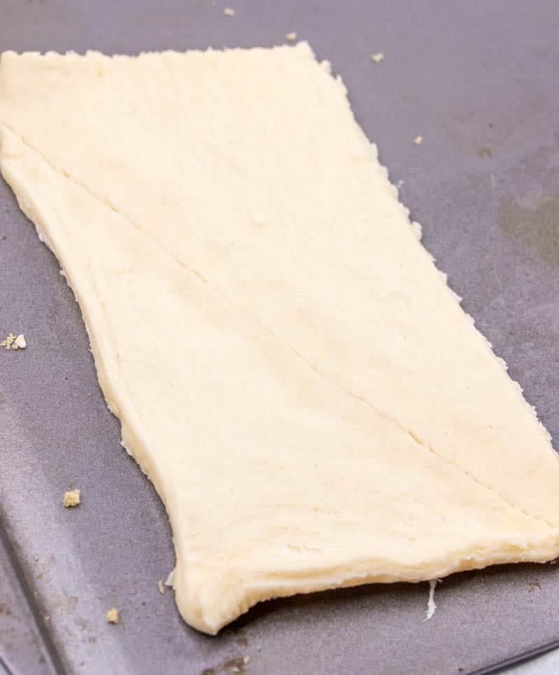 sealing perforations of crescent roll dough.