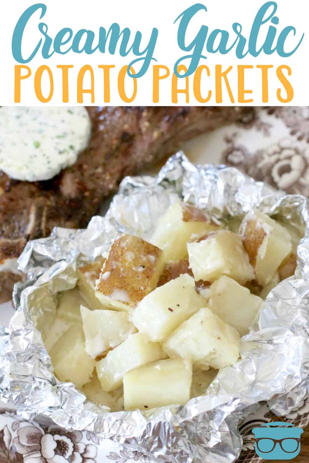 closeup photo of garlic potatoes in aluminum foil on a plate.