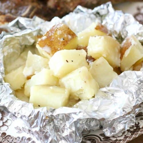 Creamy Garlic Potato Packets with grilled steak