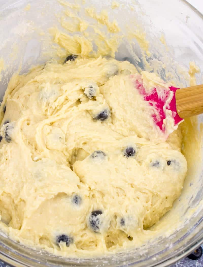 biscuit blueberry cake batter in a glass bowl.