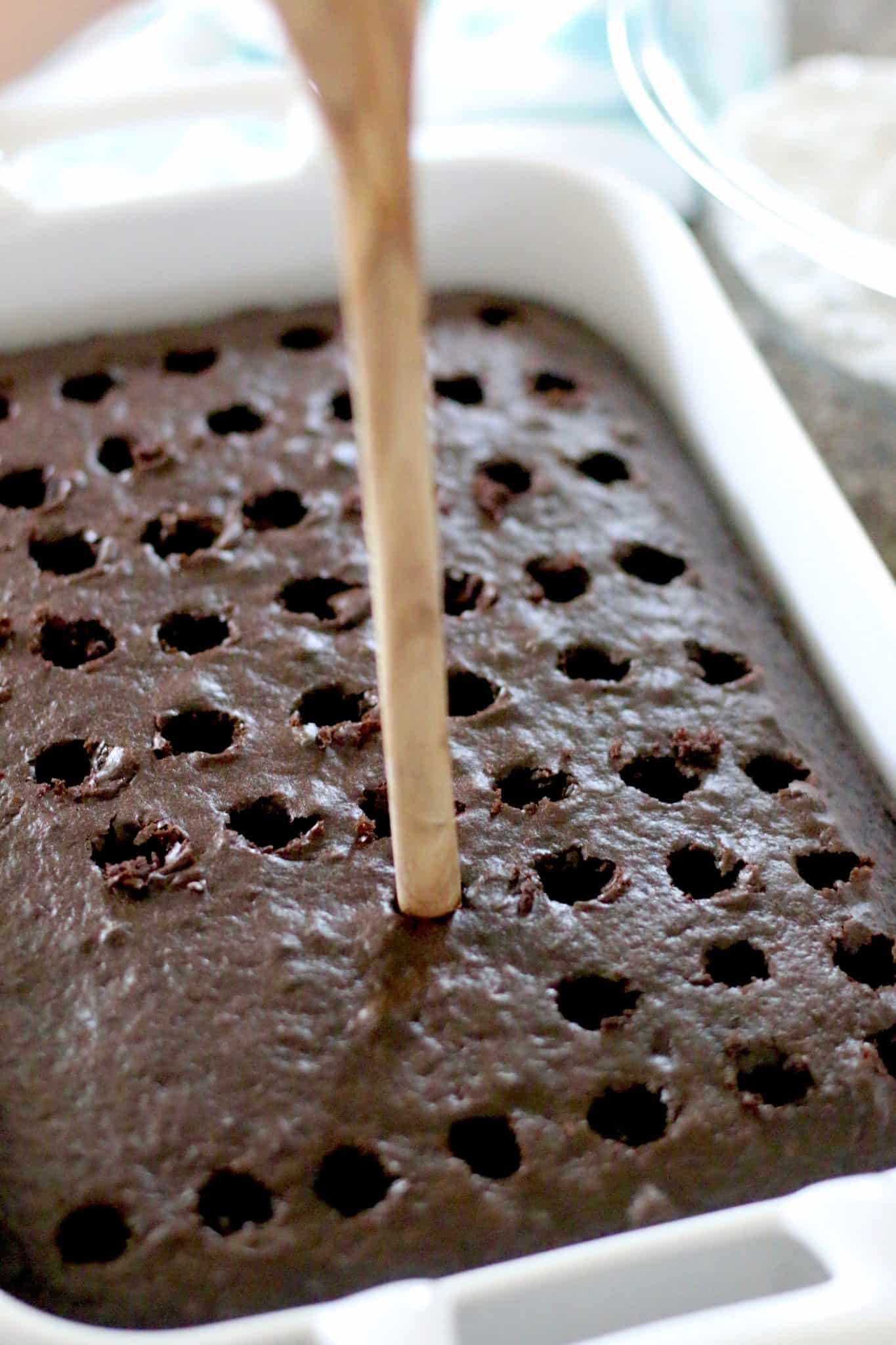 chocolate cake poked with holes.