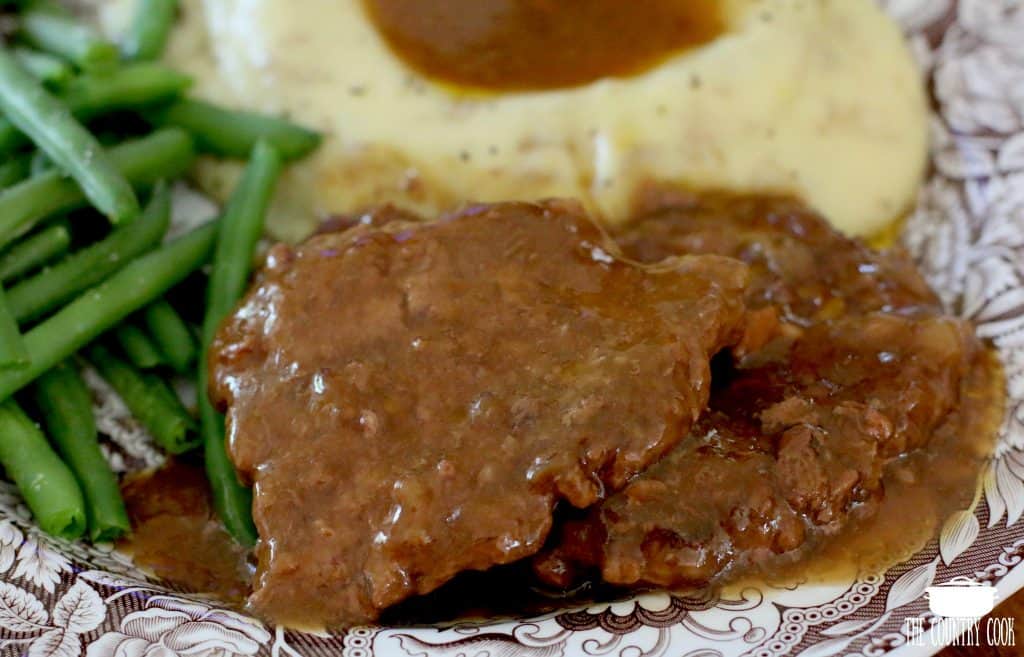 Crock Pot Cubed Steak with Gravy and mashed potatoes.