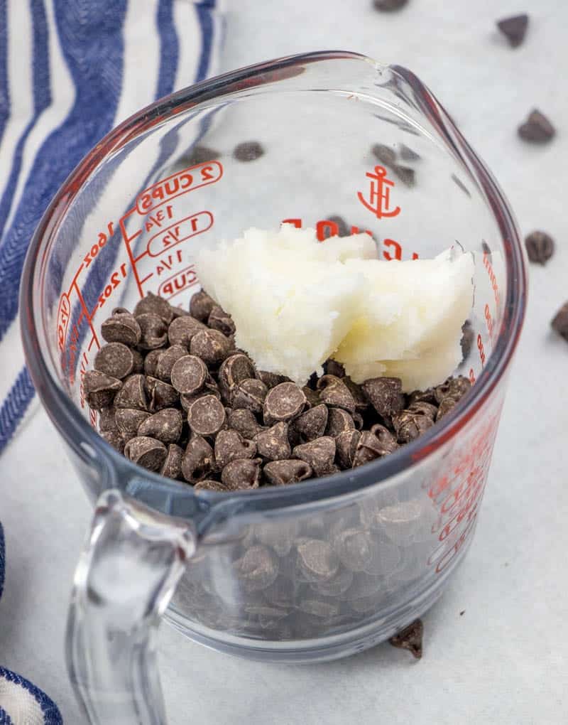 semi sweet chocolate chips and coconut oil in a microwave safe measuring cup.