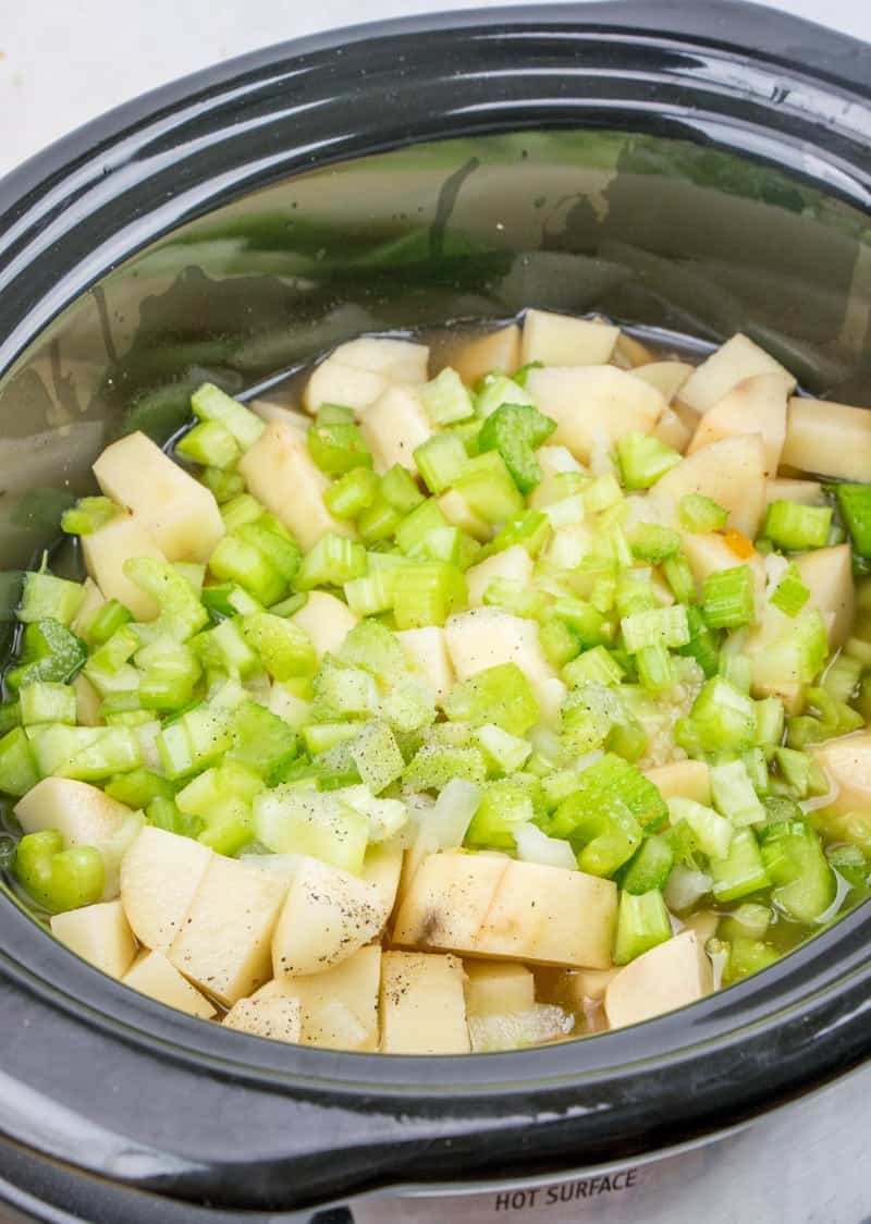 diced potatoes, celery, onion and garlic in a 6-quart oval crock pot.