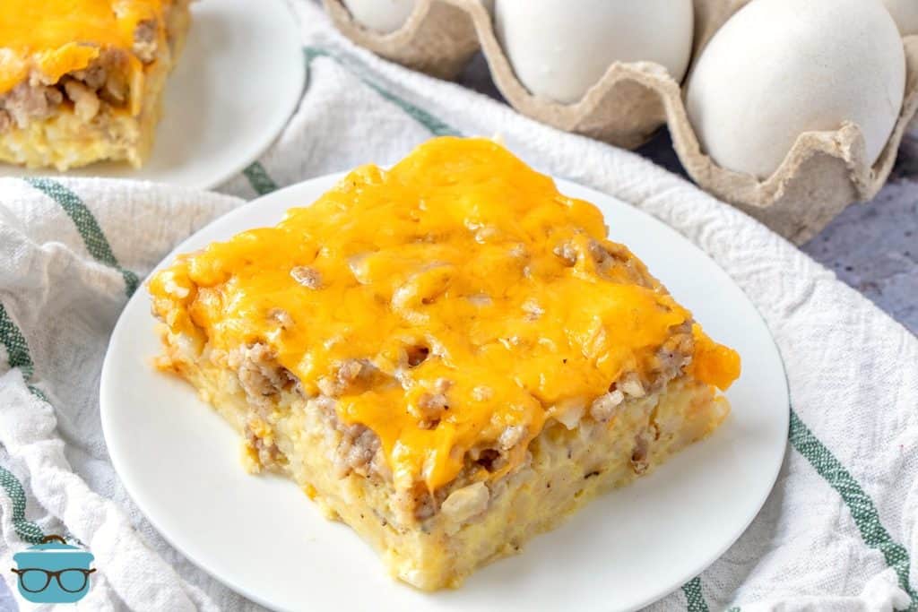 slice, Sausage Hash Brown Casserole on a white plate