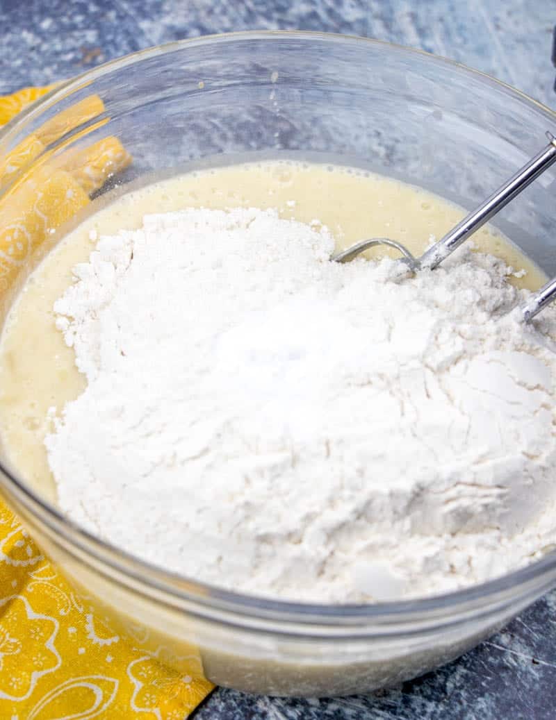 all purpose flour and baking soda added to banana cake batter.