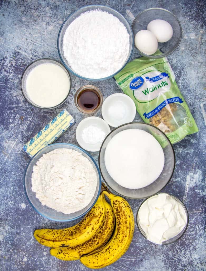ripe bananas, butter, all purpose flour, vanilla extract, baking soda, eggs, powdered sugar, chopped walnuts