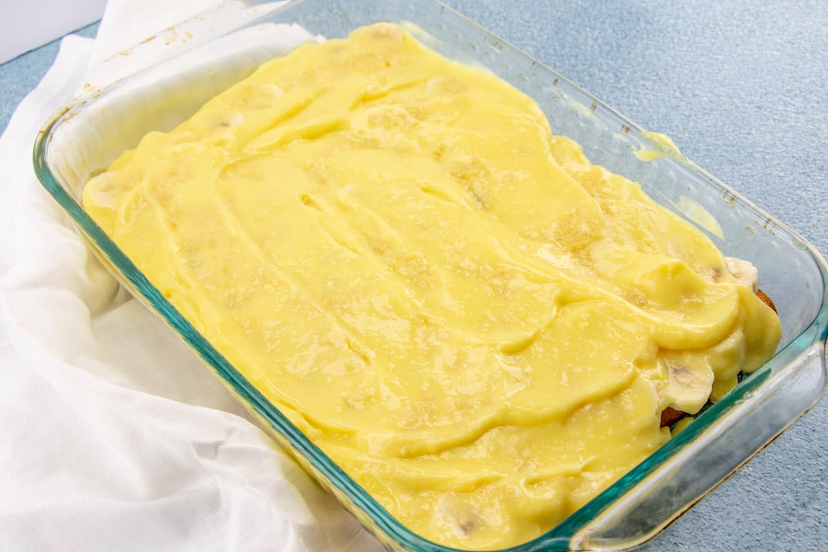 instant pudding spread on top of pineapple and bananas.