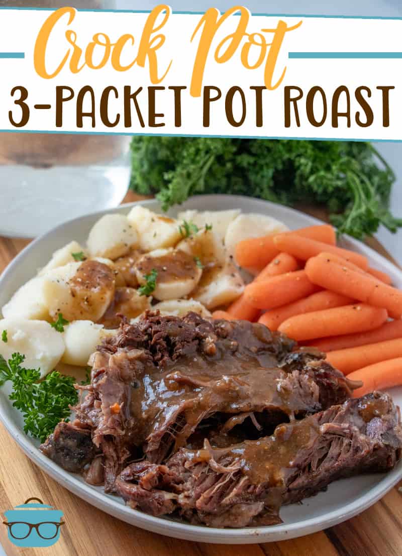 Crock Pot 3-Packet Pot Roast recipe from The Country Cook, shown served on a white plate with baby carrots and potatoes.
