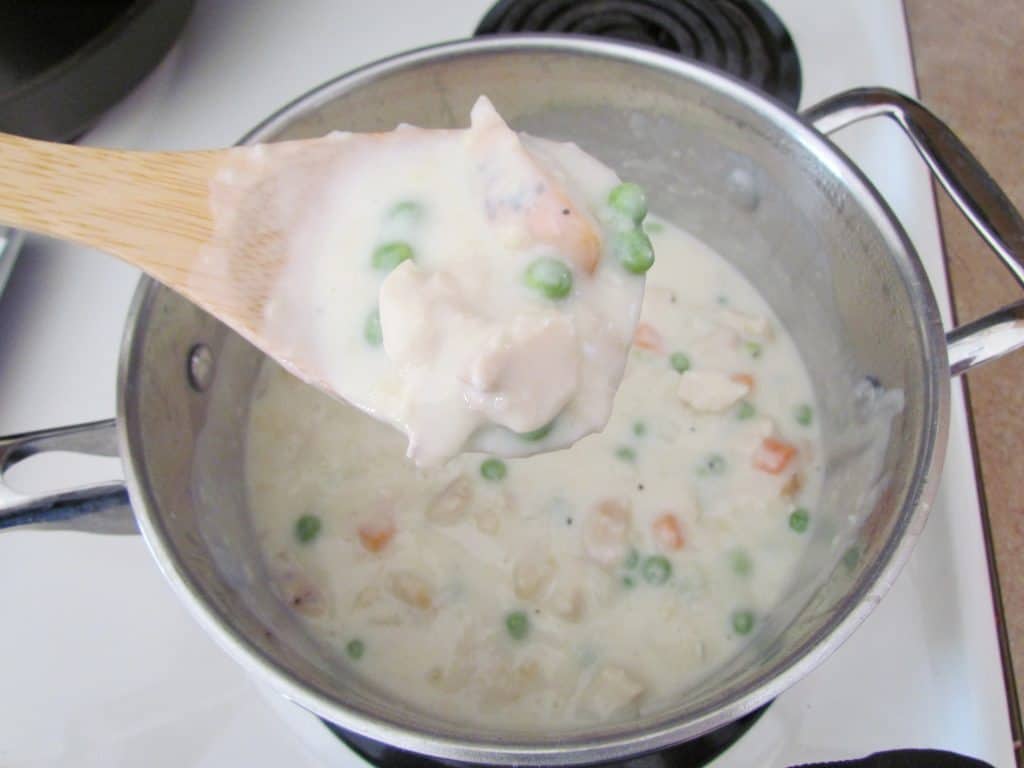 spoonful of homemade chicken pot pie filling