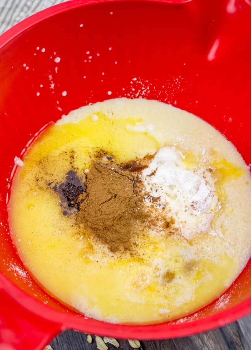 milk, brown sugar, cinnamon, beaten eggs, baking powder, maple extract in a mixing bowl.