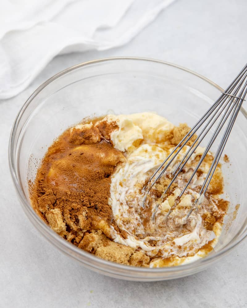 Greek yogurt, mayonnaise, brown sugar and cinnamon whisked together in a bowl