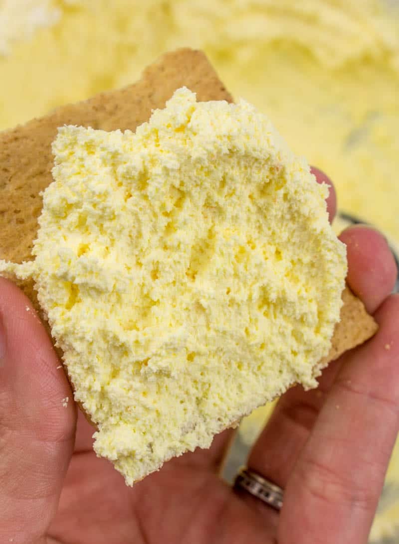 Cool Whip frosting spread on graham crackers