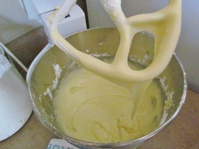 cream cheese, eggs, butter and vanilla extract mixed together in a stand mixer.