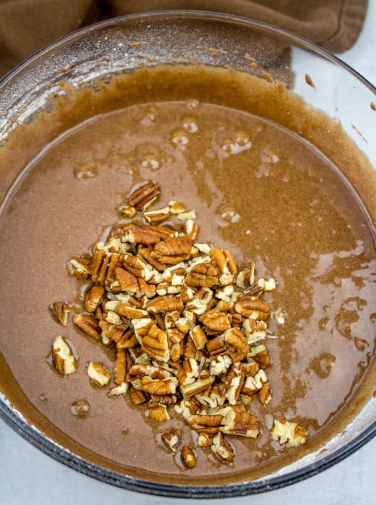 chopped pecans added to fudge pie batter