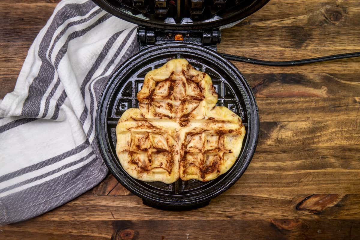 pressed and baked cinnamon rolls inside a waffle maker. 