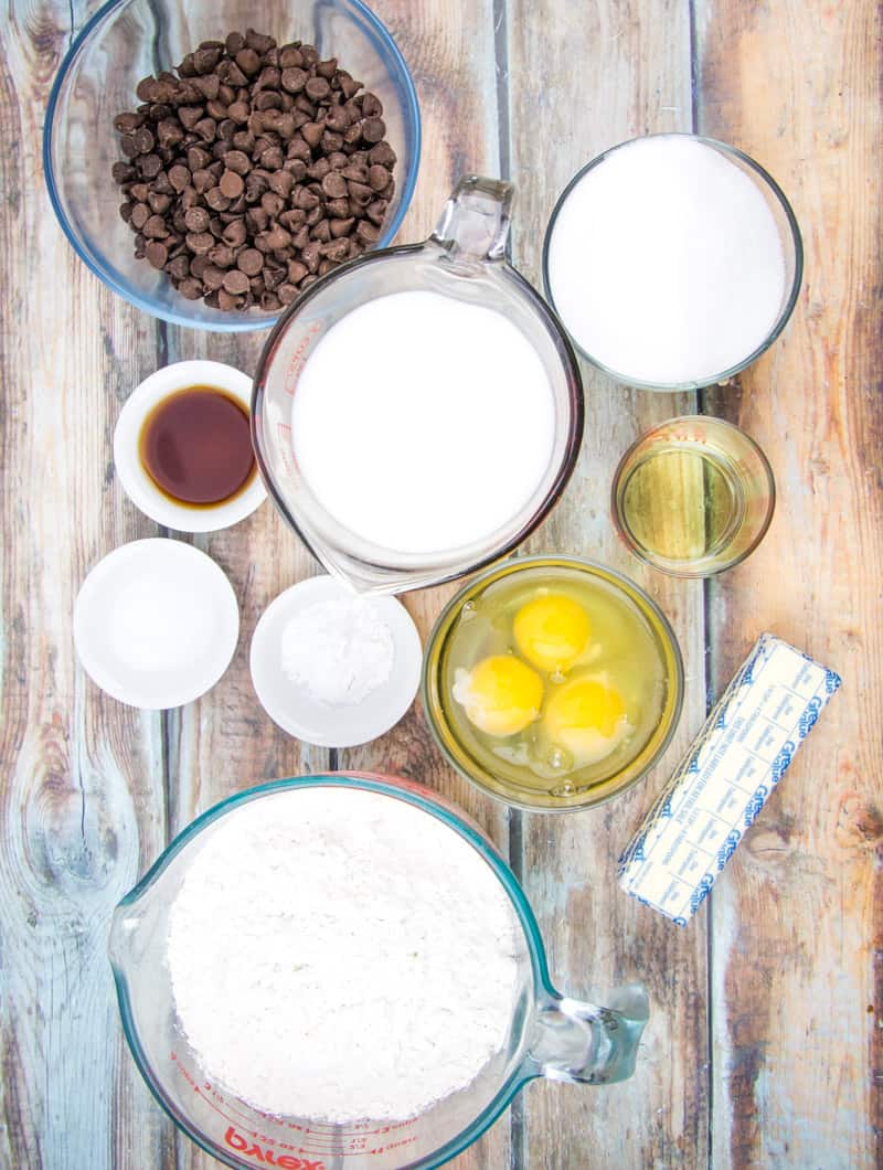 all-purpose flour, sugar, baking powder, salt, milk chocolate chips, butter, vegetable oil, eggs, milk, vanilla extract.