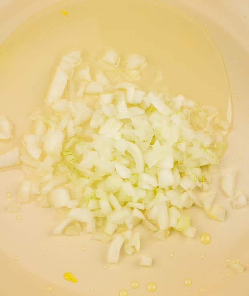 saute diced onions in a skillet with a small amount of oil.