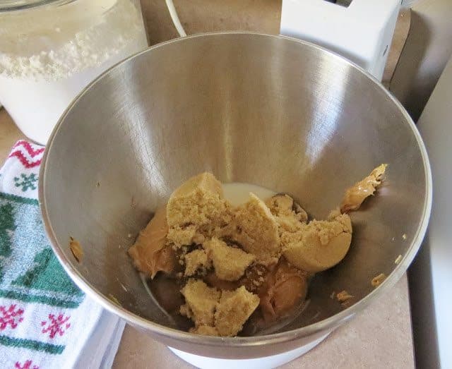 brown sugar, peanut butter, milk and vanilla extract in the bottom of a mixing bowl 