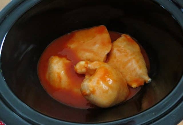 fully coated chicken breasts in a slow cooker. 