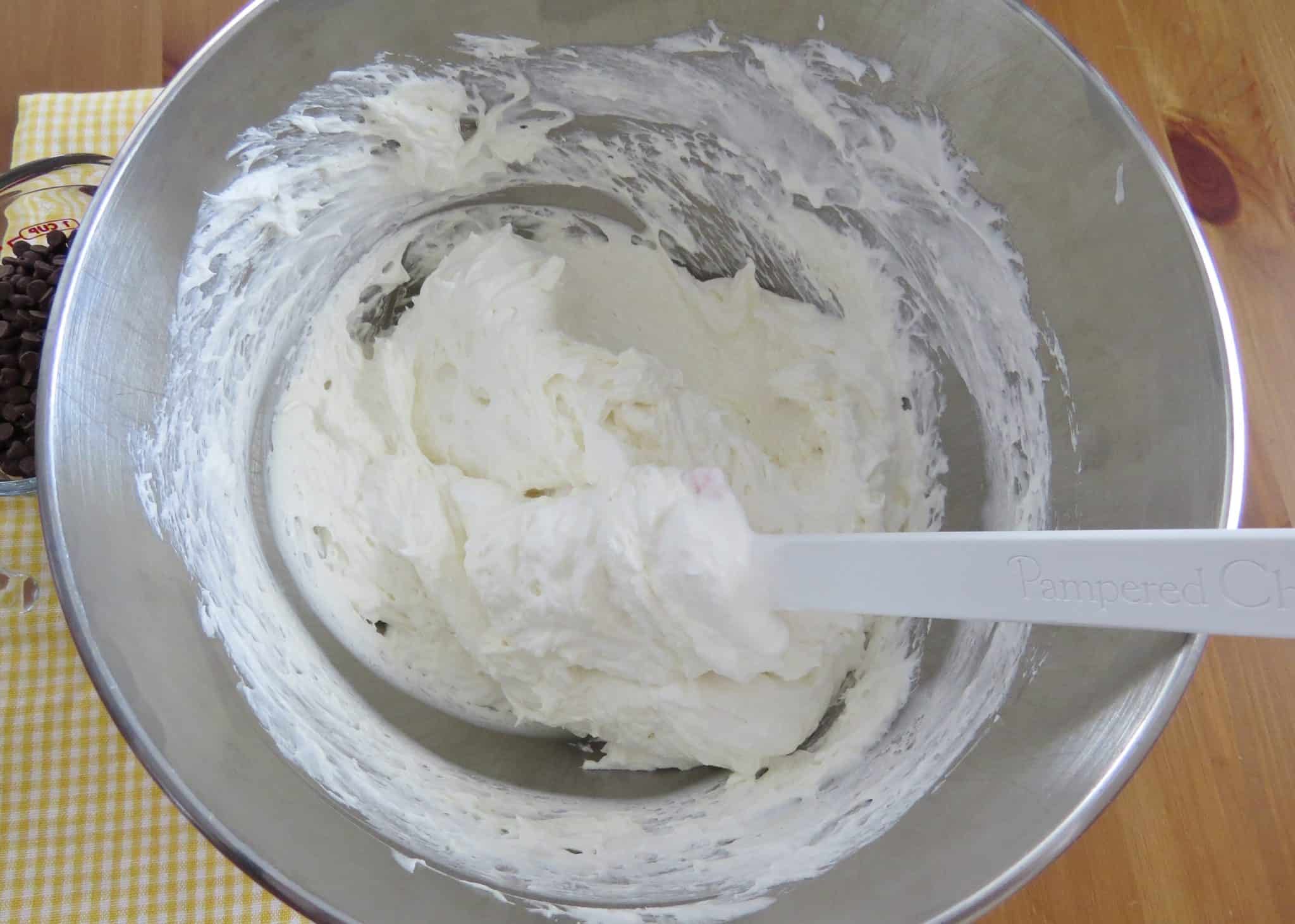 gently folding in Cool Whip to cream cheese mixture.
