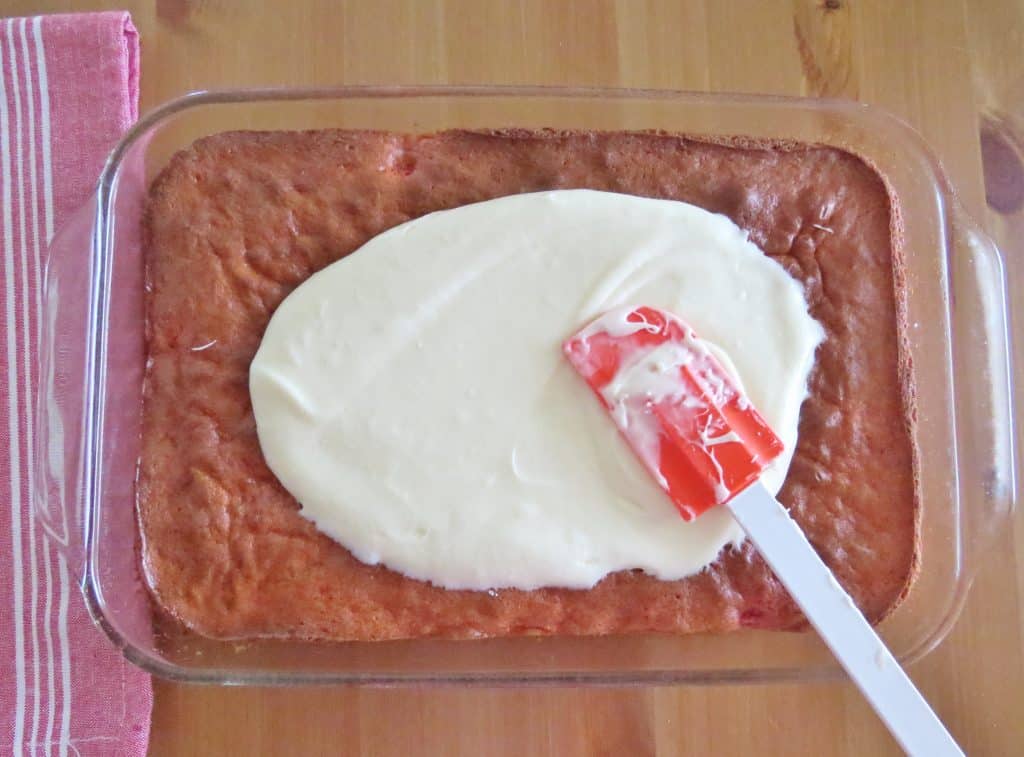 cream cheese frosting on strawberry cake
