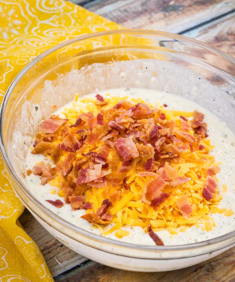 shredded cheese and bacon added to muffin batter