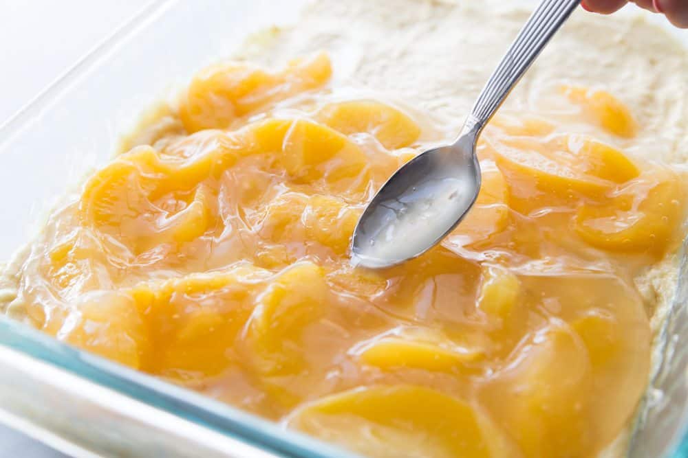 peach pie filling spread on top of cake mix