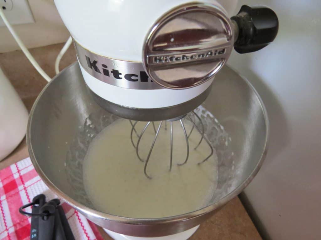stand mixer with whisk attachment whisking cold heavy cream