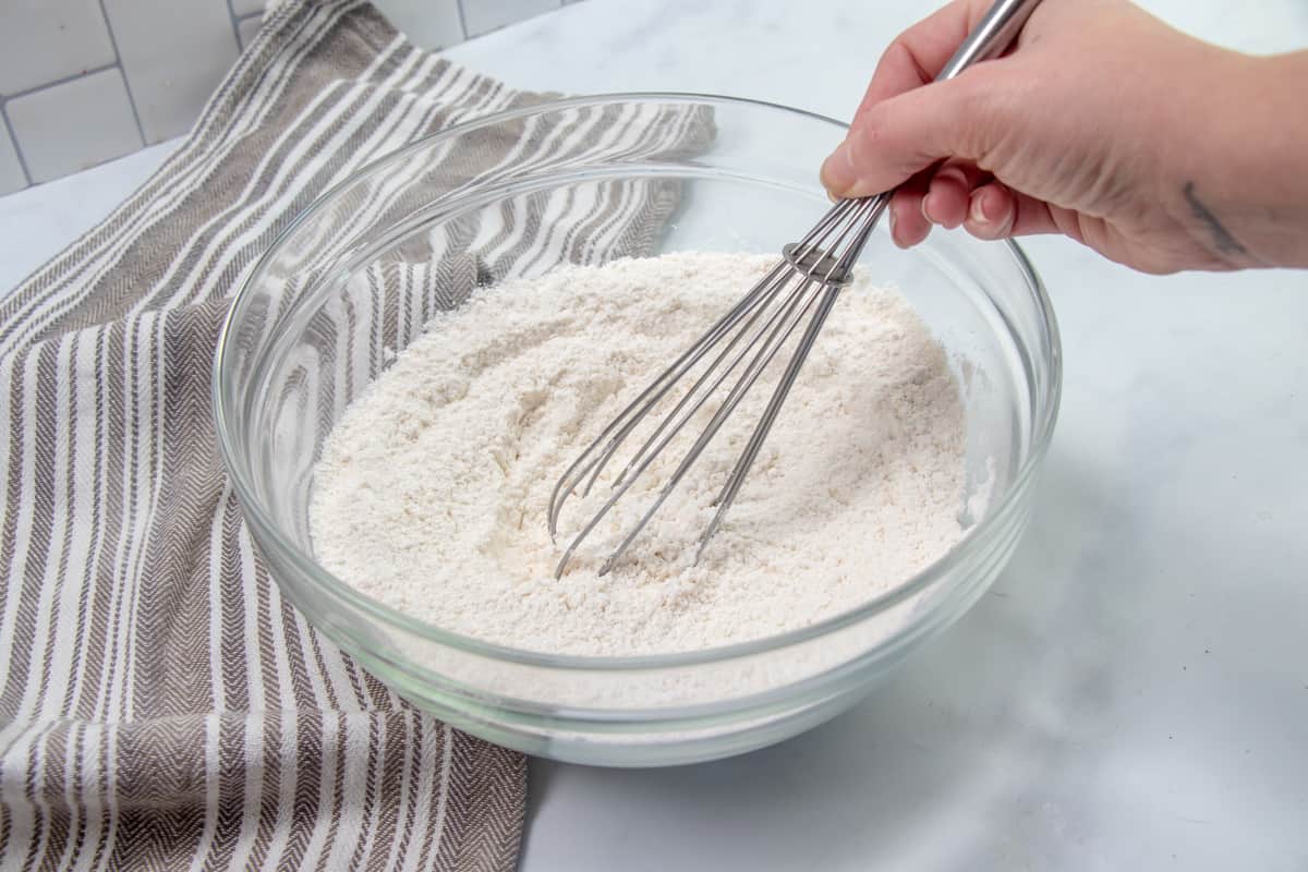 flour, sugar, baking powder and salt whisked together in a bowl