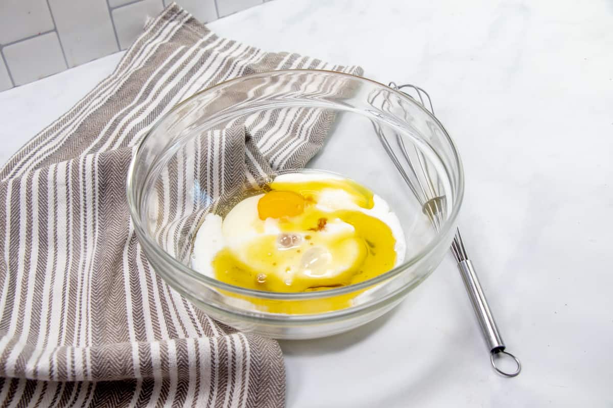 egg, milk, oil and vanilla extract whisked together in a small glass bowl