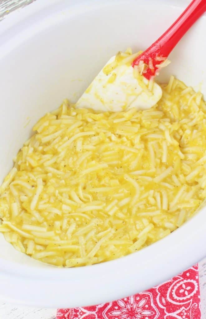 hash brown casserole spread into slow cooker