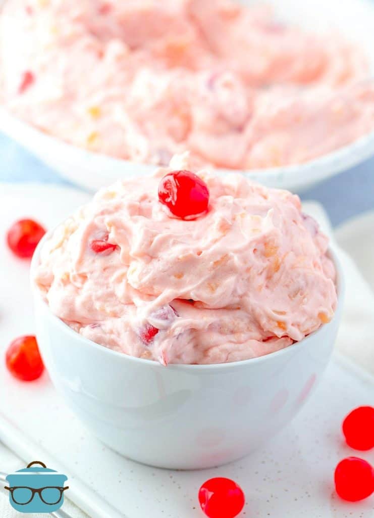 Easy Cherry Pie Fluff recipe in a bowl topped with maraschino cherries