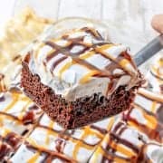 Snickers Poke Cake recipe from The Country Cook