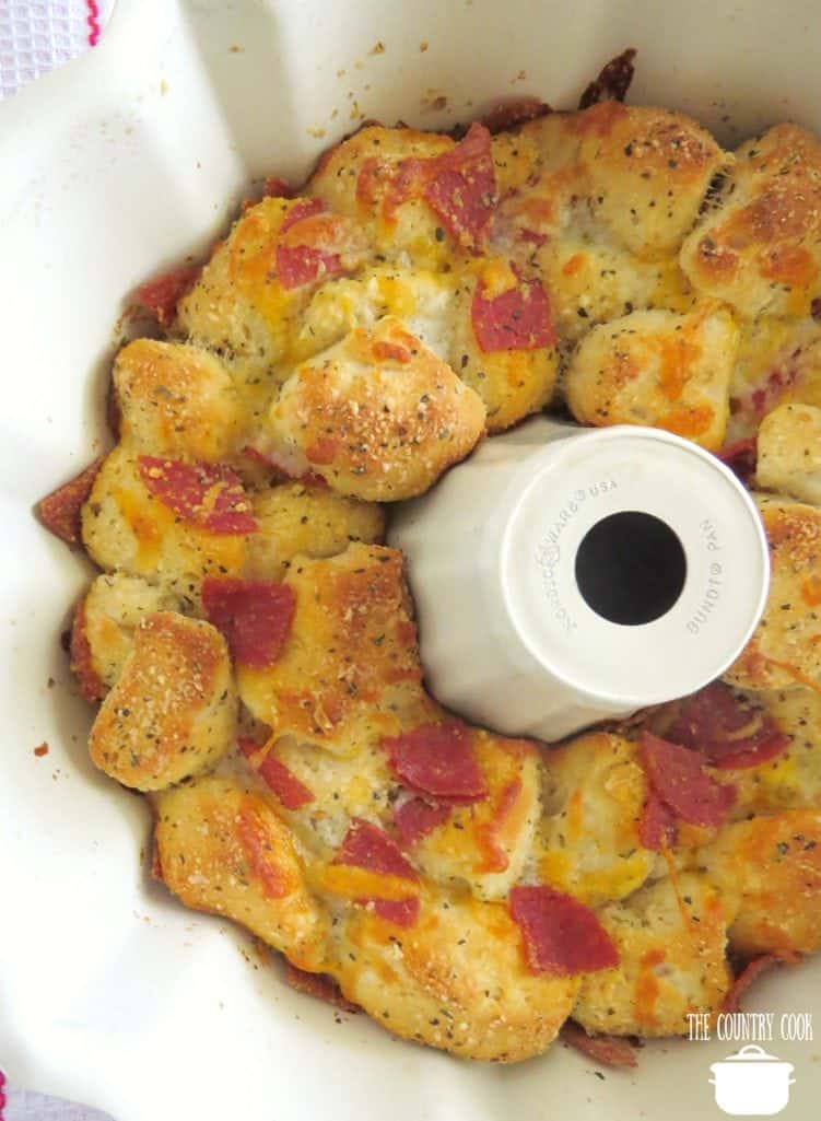 Pull Apart Pizza Bread shown fully baked in a bundt pan.