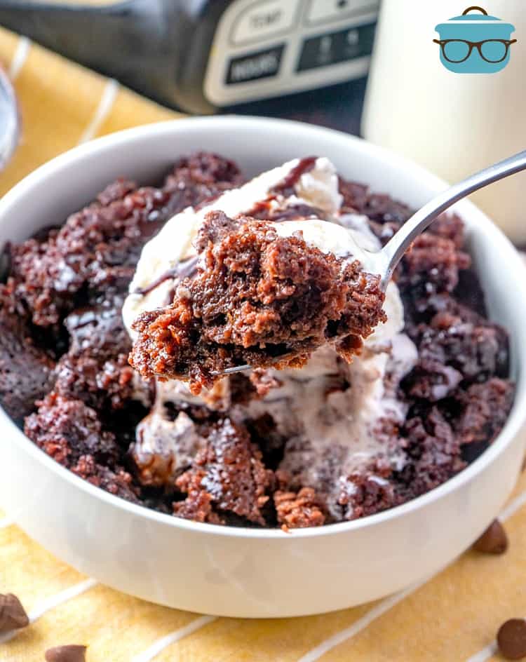 Slow Cooker Chocolate Cake, spoonful served with vanilla ice cream