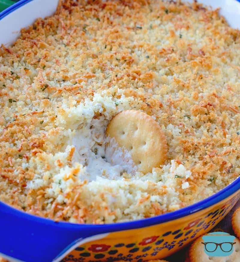 Warm and Creamy Jalapeño Popper Dip with ritz crackers to serve.