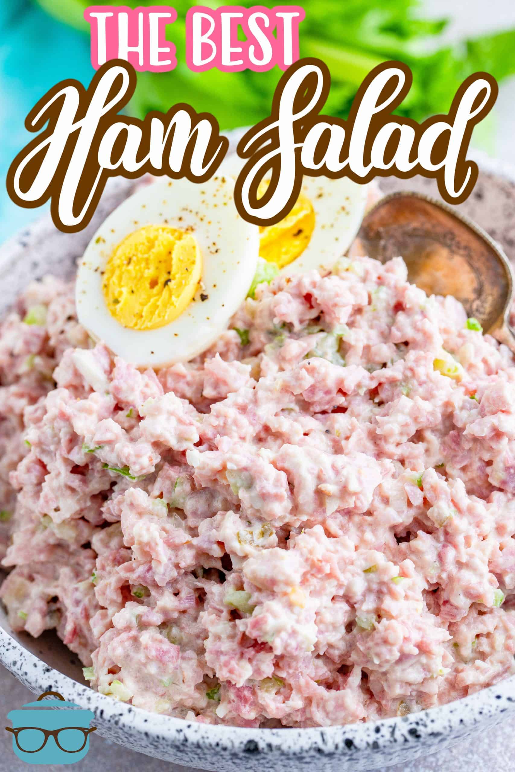 The Best Ham Salad recipe from The Country Cook, ham salad shown in a bowl with a sliced hardboiled egg on top
