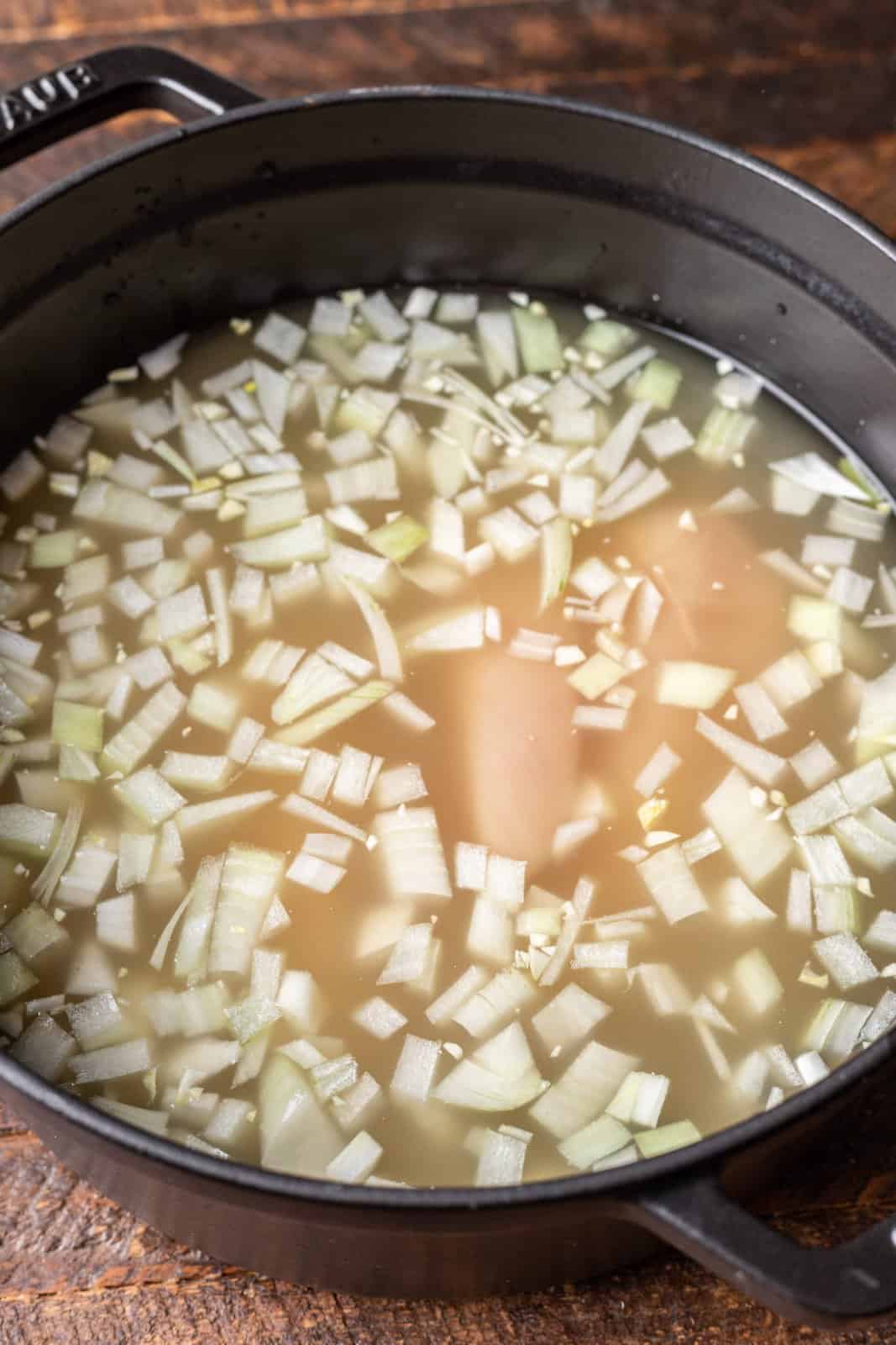 chicken broth, onion, garlic and chicken breasts in a large pot. 