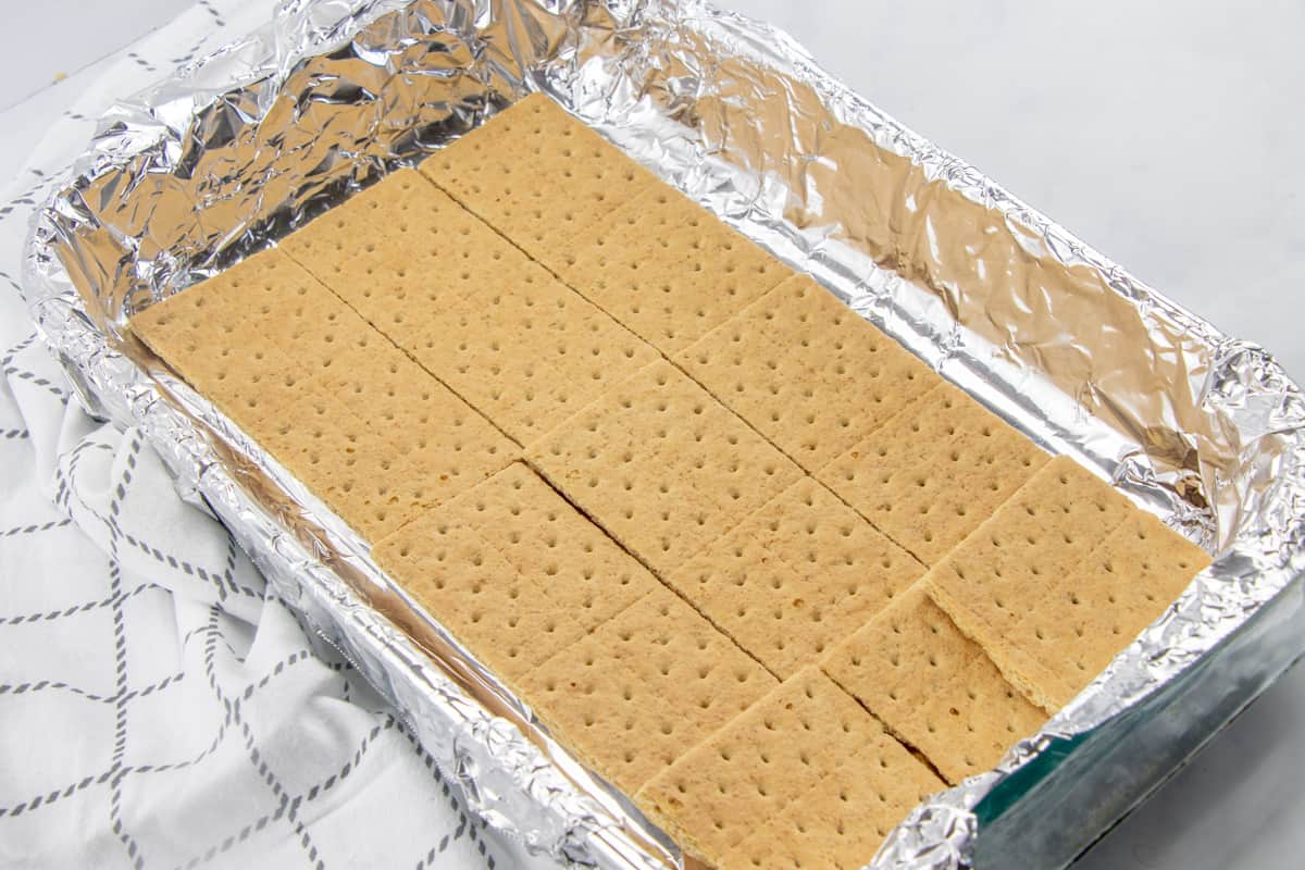 graham cracker squares layered in a 9X13 baking pan.