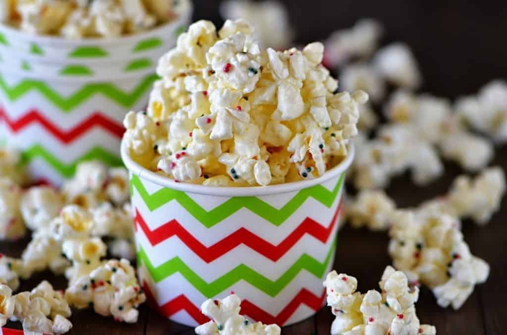 decorative bowl of white chocolate popcorn with colored sprinkles