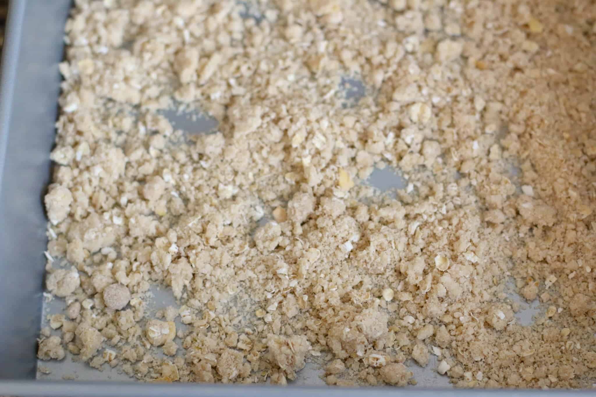 crumble topping spread on a baking sheet.