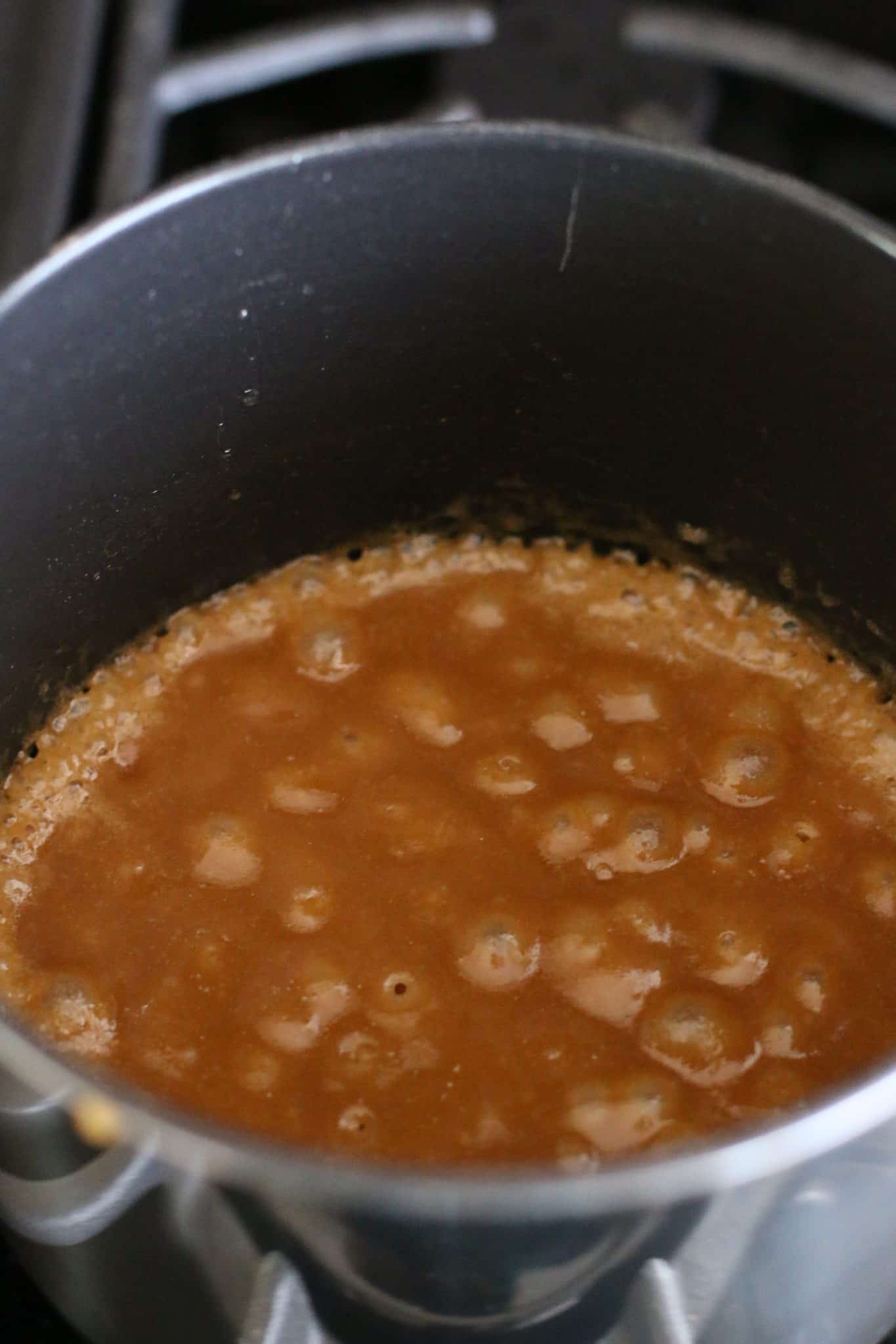 brown sugar and butter bubbling in a sauce pan.