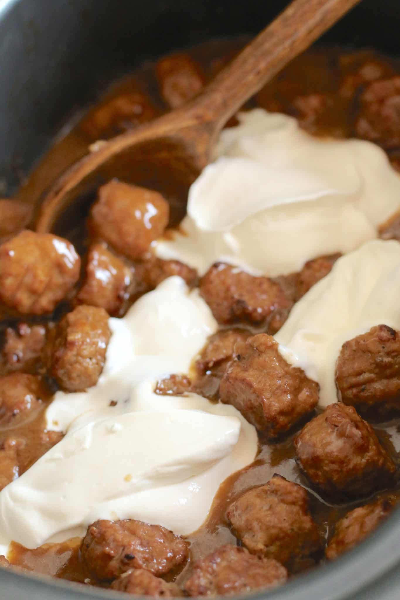 sour cream added to cooked meatballs and gravy