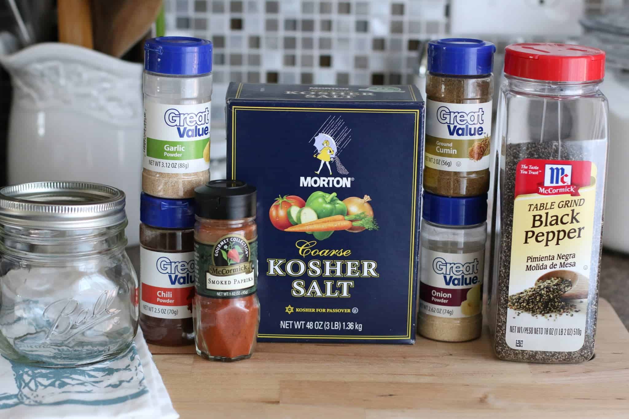 chili powder, onion powder, ground cumin, garlic powder, smoked paprika, kosher (or sea) salt, black pepper and a mason jar.